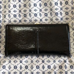Lodis black patent leather clutch gold hardware